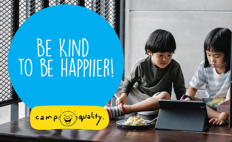 Be kind to be happier, Camp Quality. Two children looking at a tablet together