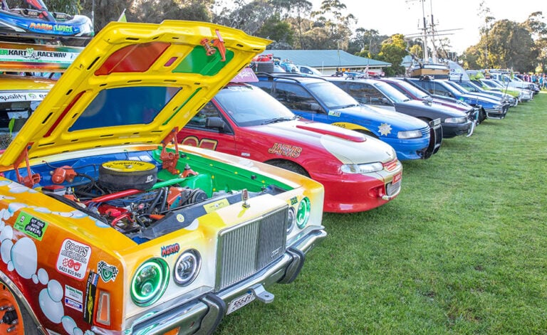 Amazingly colourful cars lined up ready for Camp Quality's esCarpade event