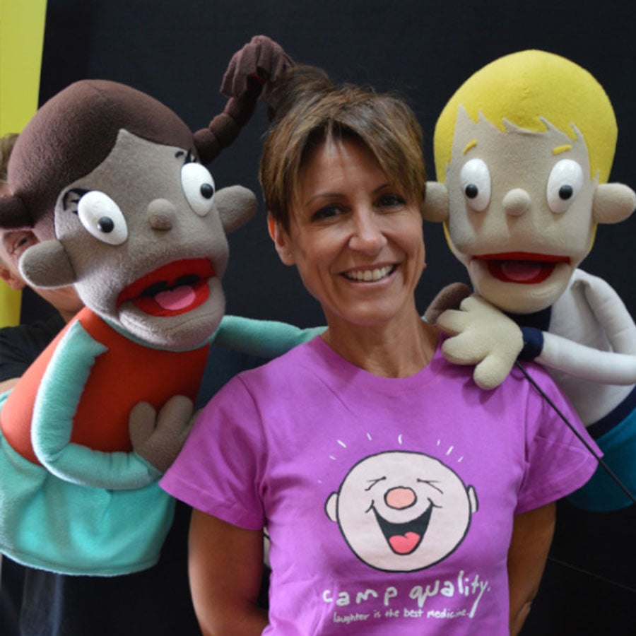 Camp Quality Ambassador, Emma Alberici, with the Camp Quality puppets