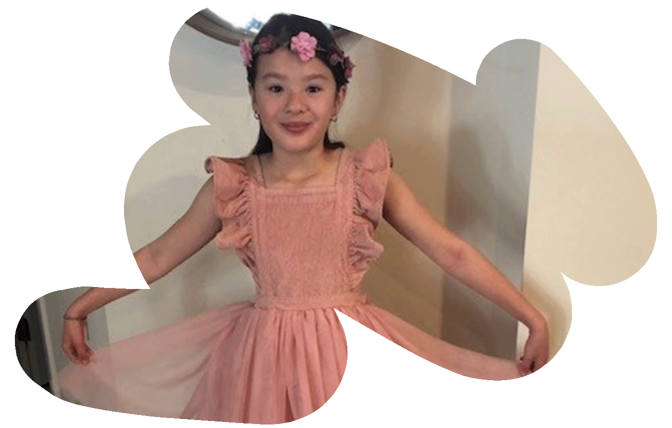 Imogen, a Camp Quality kids who loves Virtual Camps, poses in her ballet outfit