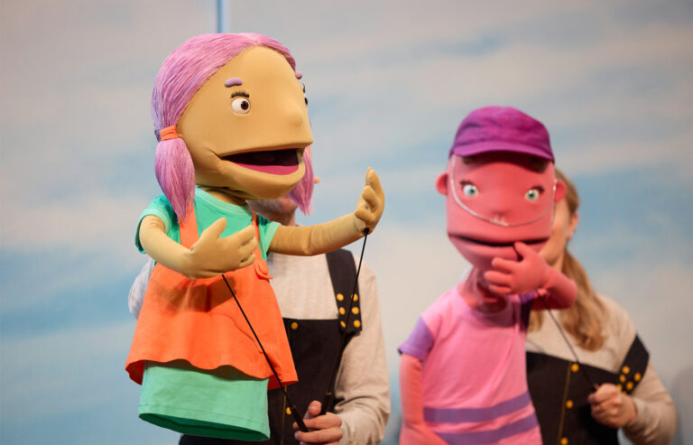 Camp Quality puppets perform to school children